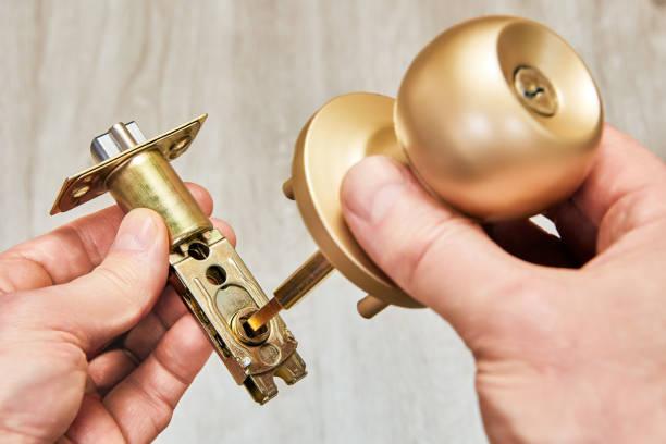 Partially assembled cylinder door lock revealing its internal components