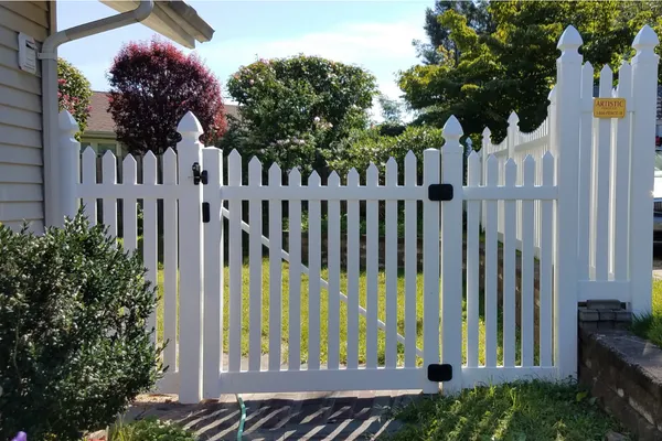 A secure fence gate lock, protecting property, people, and privacy, essential for everyday security.
