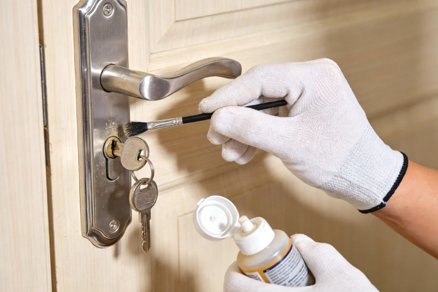 Incorrect lubrication with WD-40 leading to dust buildup and lock malfunction