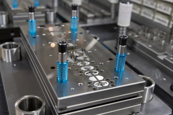 Precision stamping process for durable and thin-walled lock components.