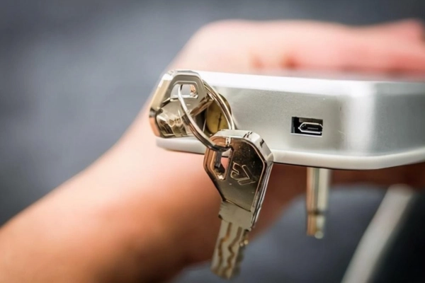 Replacing batteries in keyless entry locks for long-term reliability.