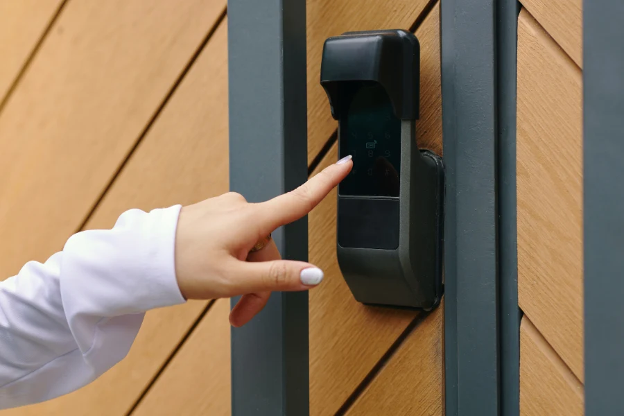 fingerprint lock cylinder installed on modern business door with keyless access