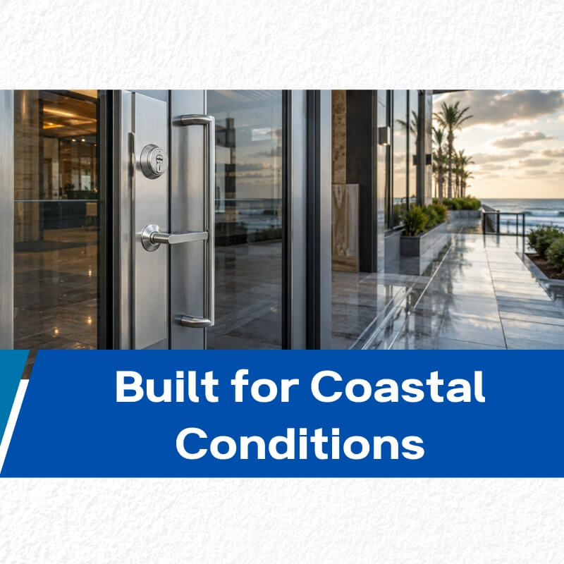 marine-grade door hardware installed on a coastal commercial building entrance